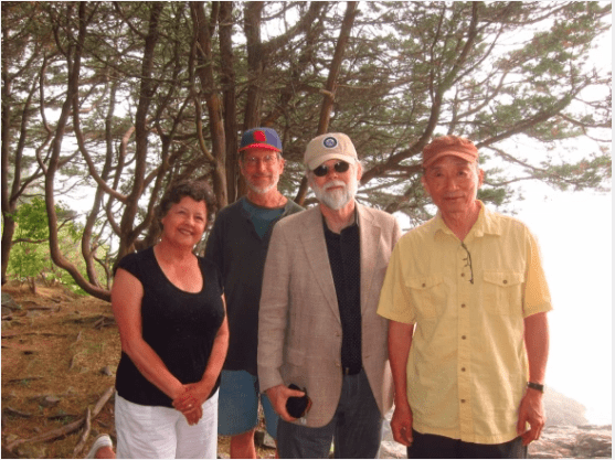 Group photo of Hilary Tann, Tom Clausen, John Stevenson, and Yu Chang, Marginal Way, Ogunquit, Maine, August 28, 2013, on the way to Onawa, Maine